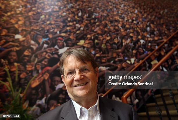 Reinhard Bonnke, the international evangelist whose Christ for All Nations is based in Orlando, Florida, poses on September 19 in front of a photo...