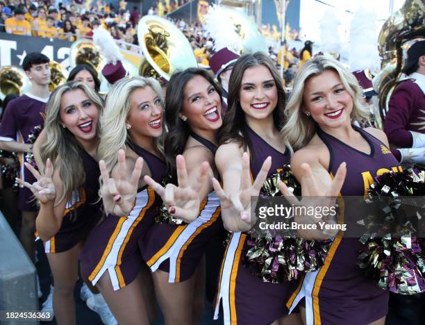 Members of the ASU Spirit Squad pose for a photo before the University of Arizona Wildcats versus the Arizona State Sun Devils football game at...