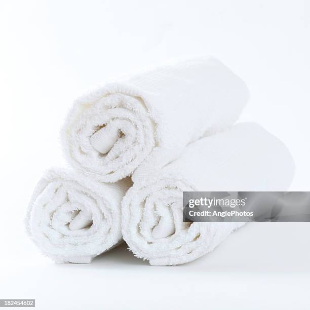 three clean white towels - towel stockfoto's en -beelden