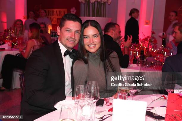 Andre Lemmers, Super model Adriana Lima during the 15th Mon Cheri hosts Barbara Tag at Isarpost on December 4, 2023 in Munich, Germany.