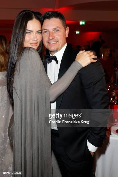 Andre Lemmers and Adriana Lima during the Mon Cheri Hosts Barbara Tag at Isarpost on December 4, 2023 in Munich, Germany.