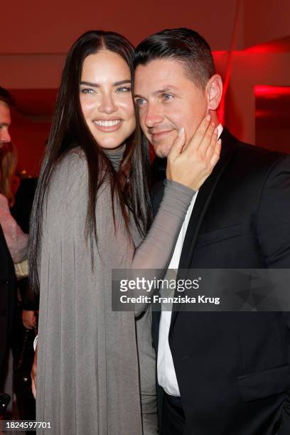 Andre Lemmers and Adriana Lima during the Mon Cheri Hosts Barbara Tag at Isarpost on December 4, 2023 in Munich, Germany.