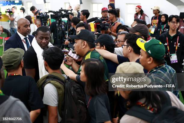 Soumaila Coulibaly, Head Coach of Mali, is interviewed following the FIFA U-17 World Cup 3rd Place Final match between Argentina and Mali at Manahan...