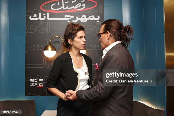 Maïwenn and Johnny Depp attend the screening of "Jeanne Du Barry" during the Red Sea International Film Festival 2023 at VOX Cinema on December 01,...