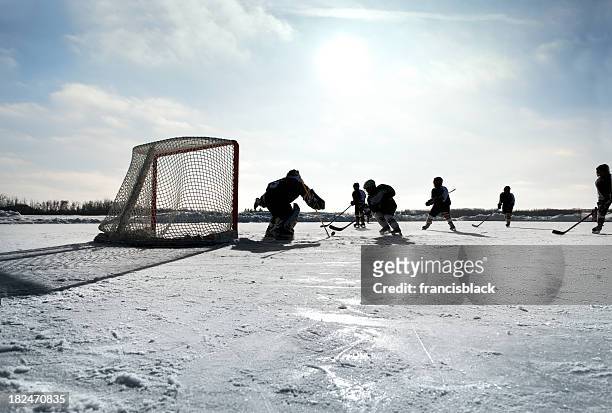 pond hockey - goaltender ice hockey player stock-fotos und bilder
