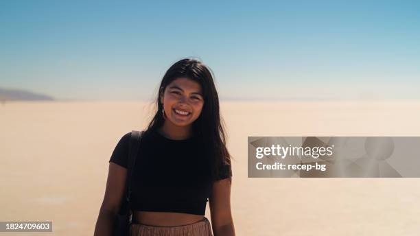 portrait of female multiracial tourist in tuz gölü salt lake in anatolia region of türkiye turkey - daily life in ankara stock pictures, royalty-free photos & images