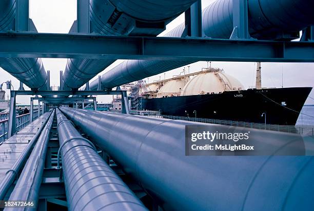 view of pipes in the oil industry - gasoline stock pictures, royalty-free photos & images