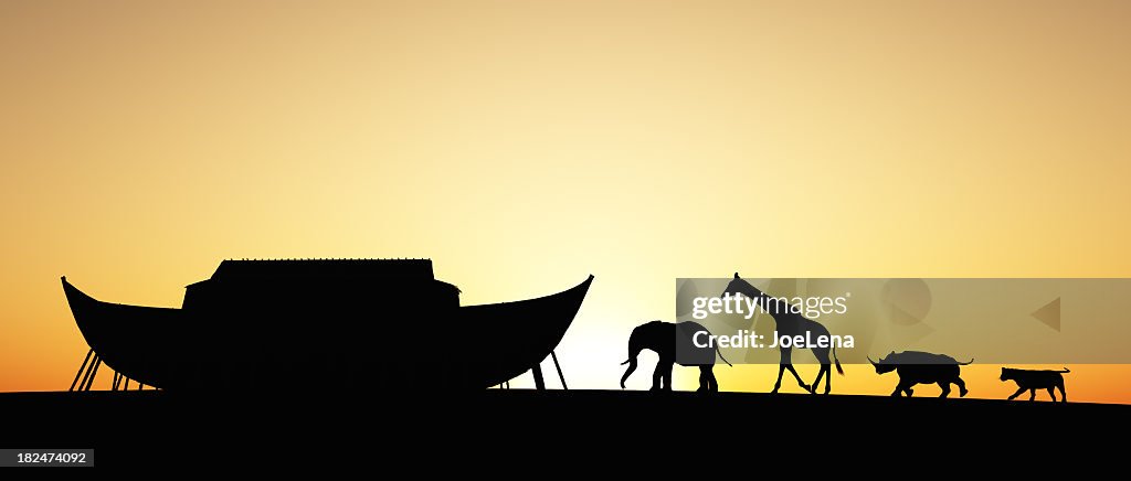 Silhouette of Noah's Ark with animals at sunset