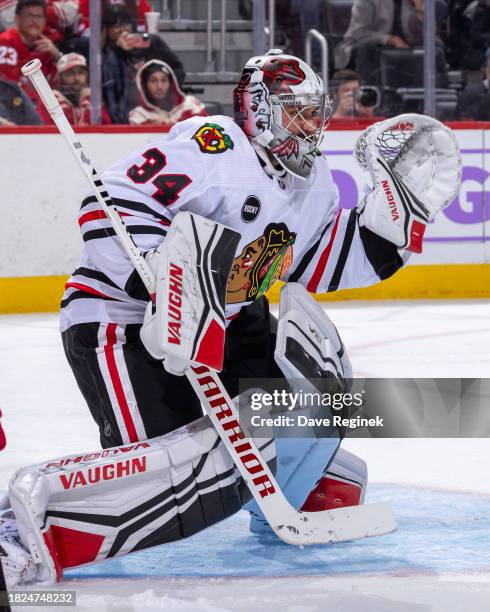 Petr Mrazek of the Chicago Blackhawks looks down the ice against the Detroit Red Wings during the third period at Little Caesars Arena on November...