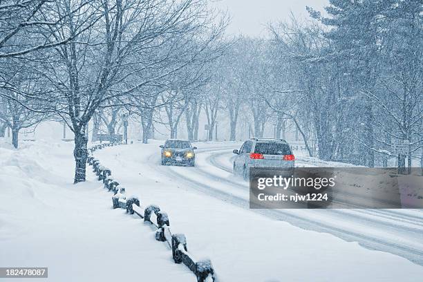 winter snow driving - sleet stock pictures, royalty-free photos & images