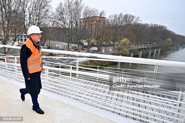 Thomas Bach IOC President visits the Paris 2024 Olympic Village construction site on December 01, 2023 in Paris, France.