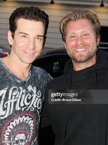 Andy Karl and fitness expert Craig Ramsay pose at The August Wilson Theater on September 29, 2013 in New York City.