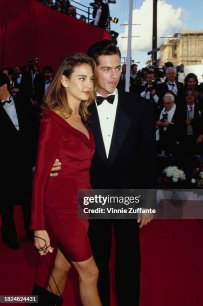 American actress Jill Goodacre and her husband, American singer and actor Harry Connick Jr attend the 63rd Academy Awards, held at the Shrine...