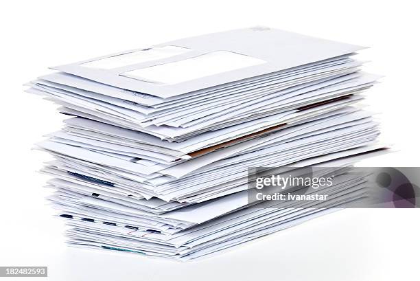 stack of unpaid bills and envelopes isolated on white - bill stockfoto's en -beelden