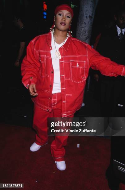 American rapper Da Brat, wearing red trousers with a red jacket over a white t-shirt and a red bandana, attends Movieline Magazine's 2nd Annual Young...