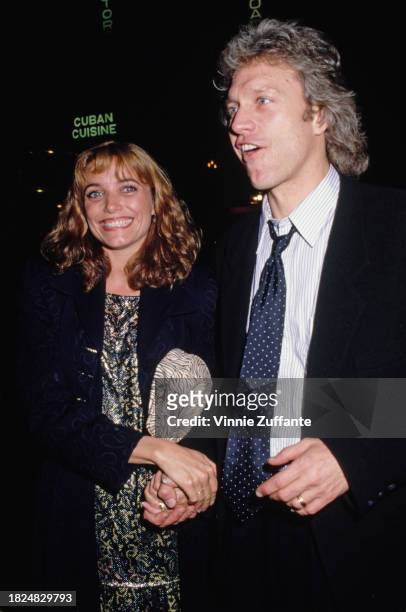 American actress Karen Allen holding hands with her husband, American actor Kale Browne, as they attend a campaign fundraiser for the Democratic...