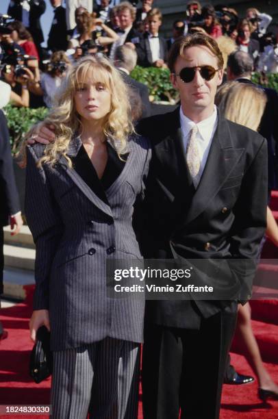 British actress Olivia d'Abo and British singer and musician Julian Lennon attend the 42nd Annual Primetime Emmy Awards, held at the Pasadena Civic...