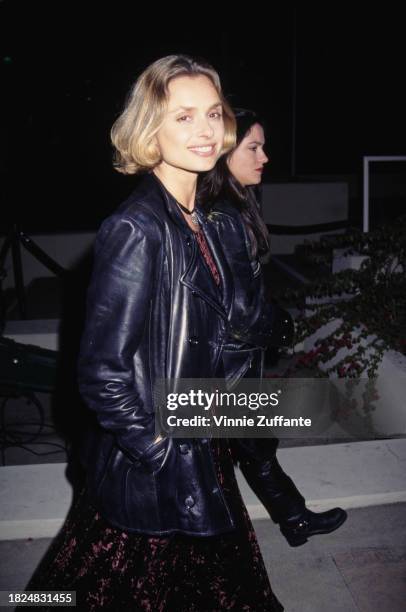 British actress Maryam d'Abo wearing a black leather jacket, her hands in the jacket pockets, attends The Rolling Stones Concert afterparty, held at...