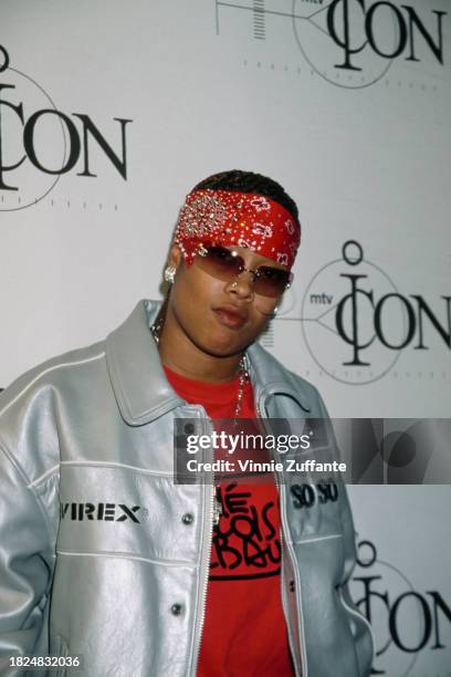 American rapper Da Brat, wearing a silver Avirex jacket over a red t-shirt, and a red bandana, attends the recording of the inaugural 'MTV Icon'...