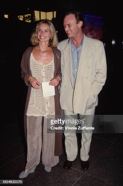 English actress Maryam d'Abo with British actor Christopher Cazenove attend a screening of 'Gettysburg', at the National Theatre in Washington, DC,...