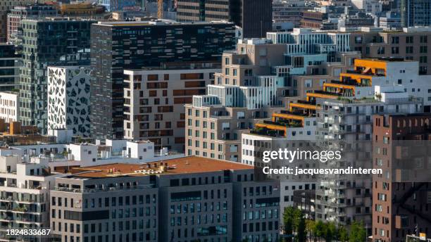 bjørvika, a new, modern and trendy area of oslo, norway. modern residential quarters - oslo business stock pictures, royalty-free photos & images
