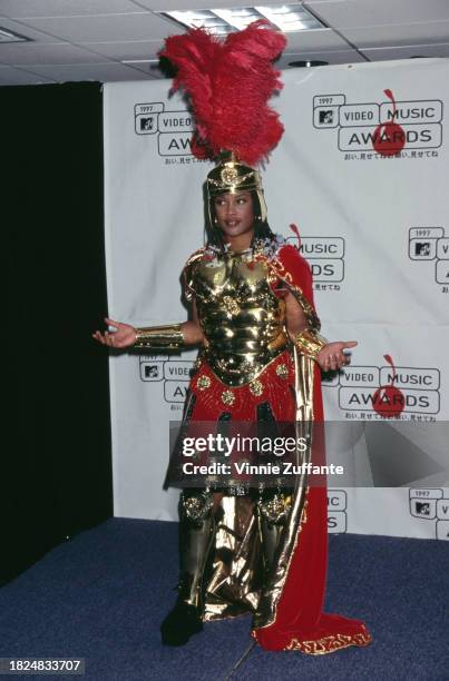 American rapper Da Brat, wearing a Roman centurion costume, in the press room of the 1997 MTV Video Music Awards, held at Radio City Music Hall in...