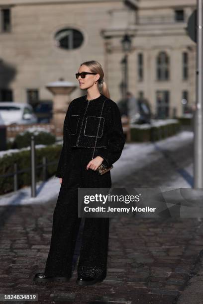 Marlies Pia Pfeifhofer seen wearing YSL brown sunglasses, H&M black boucle glitter blazer jacket, matching black boucle glitter wide leg pants, Louis...