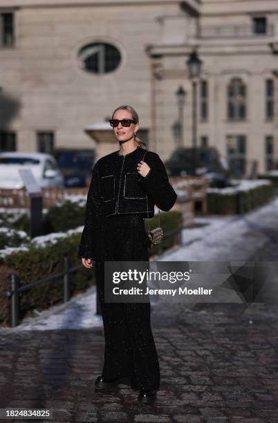 Marlies Pia Pfeifhofer seen wearing YSL brown sunglasses, H&M black boucle glitter blazer jacket, matching black boucle glitter wide leg pants, Louis...