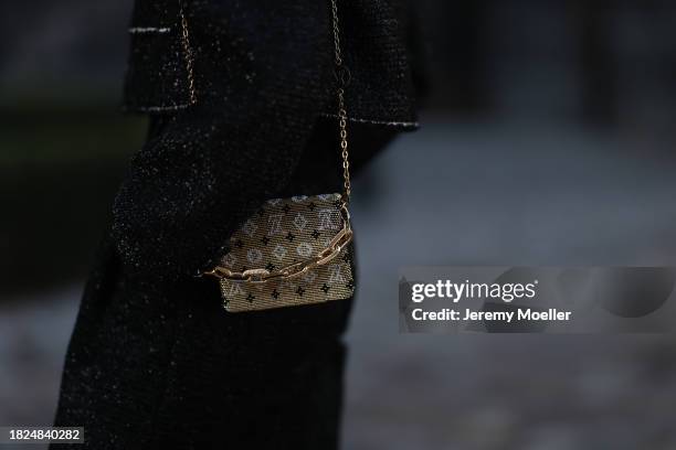 Marlies Pia Pfeifhofer seen wearing H&M black boucle glitter blazer jacket, matching H&M black boucle glitter wide leg pants, Louis Vuitton gold logo...