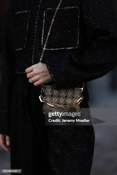 Marlies Pia Pfeifhofer seen wearing H&M black boucle glitter blazer jacket, matching H&M black boucle glitter wide leg pants, Louis Vuitton gold logo...