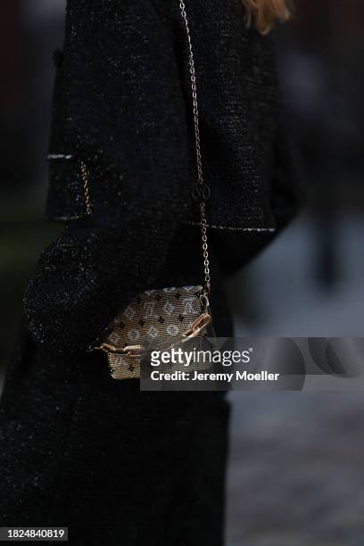 Marlies Pia Pfeifhofer seen wearing H&M black boucle glitter blazer jacket, matching H&M black boucle glitter wide leg pants, Louis Vuitton gold logo...