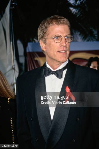 American actor Ted Danson, wearing a tuxedo and bow tie, attends the 2nd Annual Screen Actors Guild Awards, held at the Santa Monica Civic Auditorium...