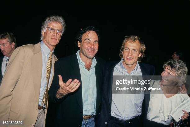 American actor Ted Danson, American film director Oliver Stone, American actor Woody Harrelson, and Harrelson's mother, Diane, attend a VIP screening...