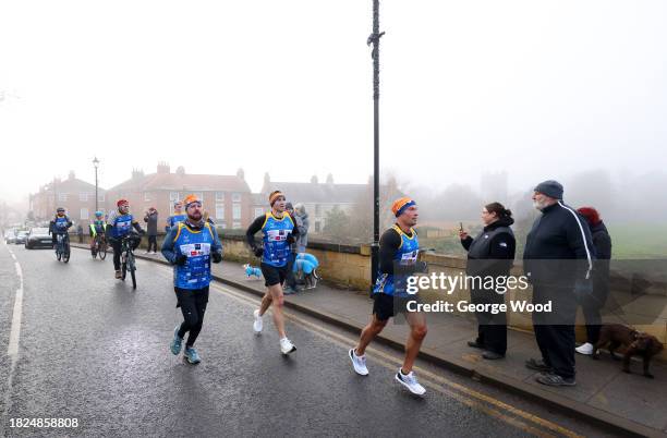 Kevin Sinfield runs over Tadcaster bridge on day one of the Kevin Sinfield Ultra 7 In 7 In 7 Marathon Challenge raising money for five charities at...