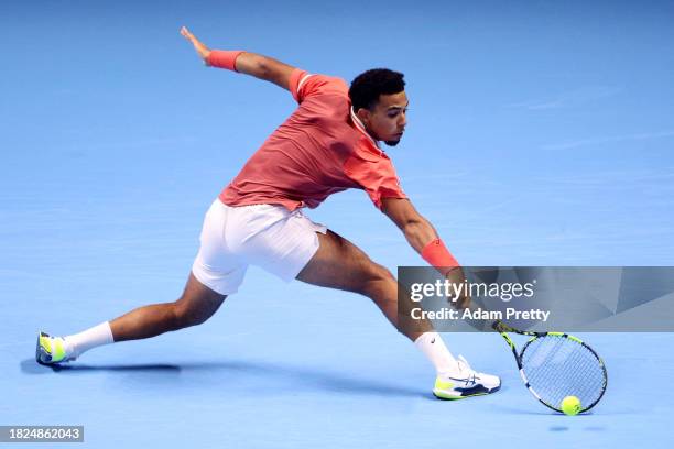 Arthur Fils of France plays a backhand against Luca Van Assche of France in their Men's Singles semi-final match during day four of the Next Gen ATP...