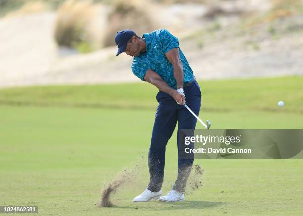 Tiger Woods of The United States plays his second shot on the third hole during the second round of the Hero World Challenge at Albany Golf Course on...