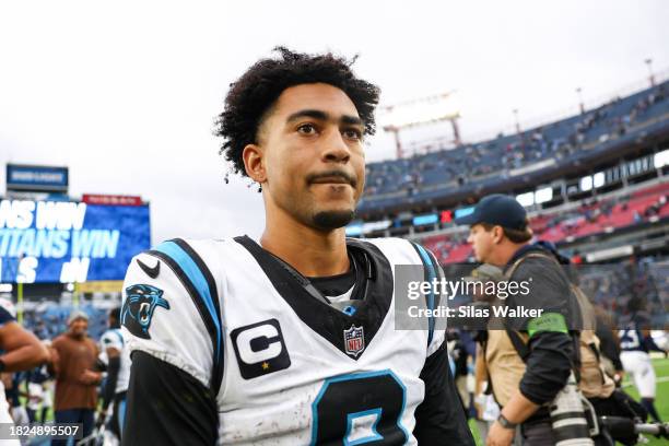 Bryce Young of the Carolina Panthers walks off the field after facing the Tennessee Titans at Nissan Stadium on November 26, 2023 in Nashville,...