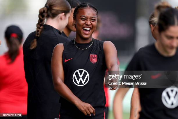 Jaedyn Shaw of the United States laughs on the field during USWNT training at DRV PNK Stadium on December 01, 2023 in Fort Lauderdale, Florida.