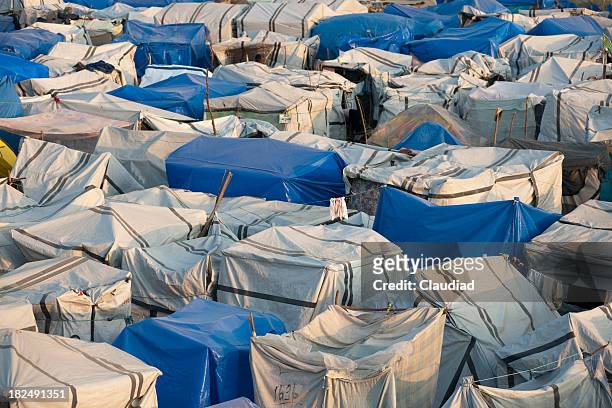 tents of an idp camp - refugee camp stock pictures, royalty-free photos & images