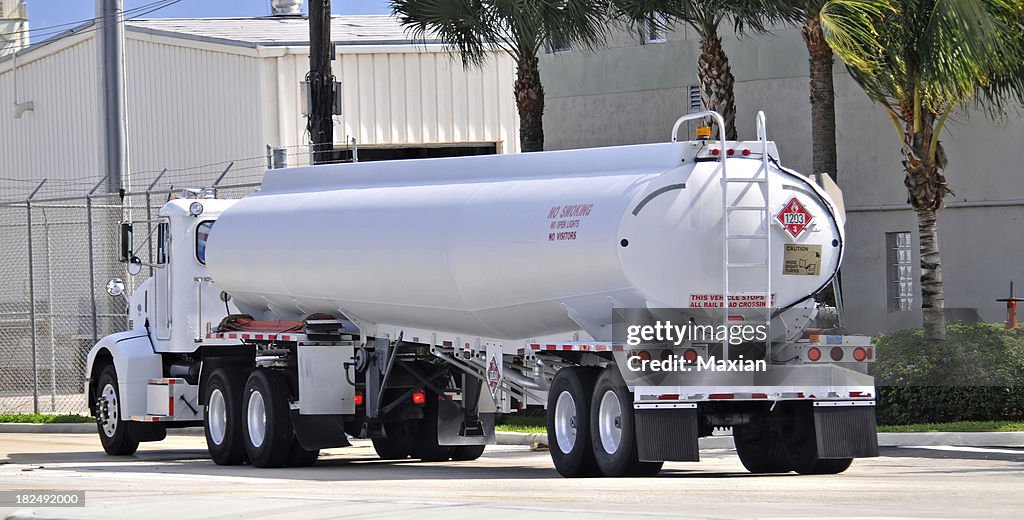 Gasoline tanker driving on city street