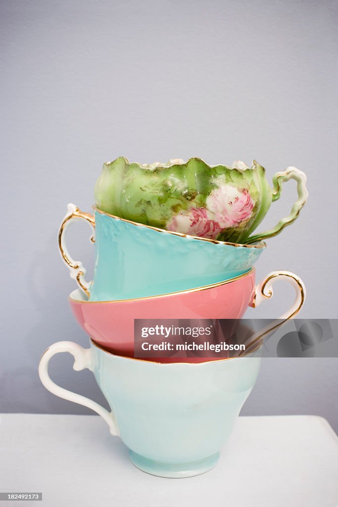 Stack of four fine delicate China teacups