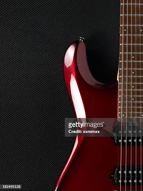 guitar and black amplifier in the background - classic rock stock pictures, royalty-free photos & images
