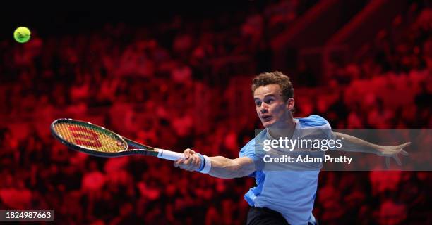 Luca Van Assche plays a backhand during day four of the Next Gen ATP Finals at King Abdullah Sports City on December 01, 2023 in Jeddah, Saudi Arabia.