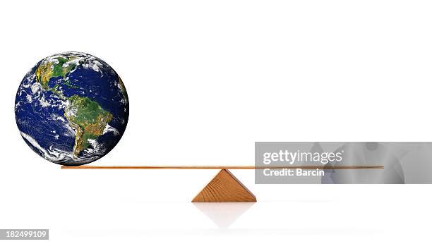 globe on scale - hefboom stockfoto's en -beelden