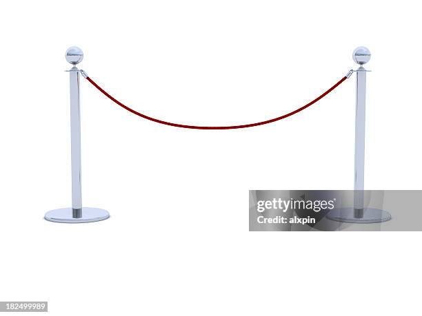 red velvet rope barrier with silver posts - roped off stockfoto's en -beelden