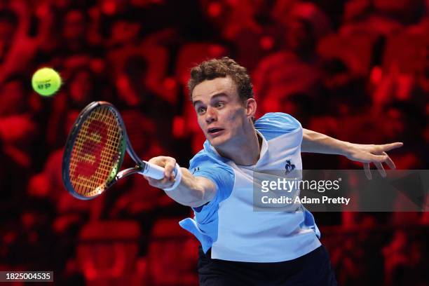 Luca Van Assche plays a backhand during day four of the Next Gen ATP Finals at King Abdullah Sports City on December 01, 2023 in Jeddah, Saudi Arabia.