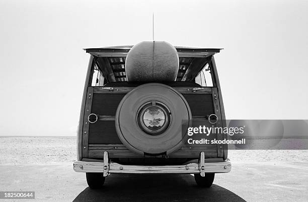old  woodie station wagon with surfboard - surfbräda bildbanksfoton och bilder