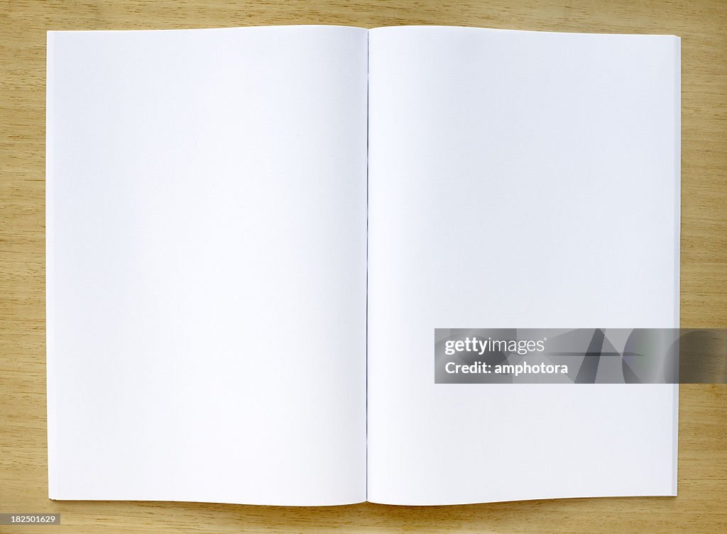 Magazine with blank pages on a table