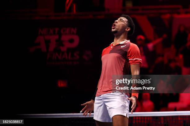 Arthur Fils celebrates after winning a point during day four of the Next Gen ATP Finals at King Abdullah Sports City on December 01, 2023 in Jeddah,...