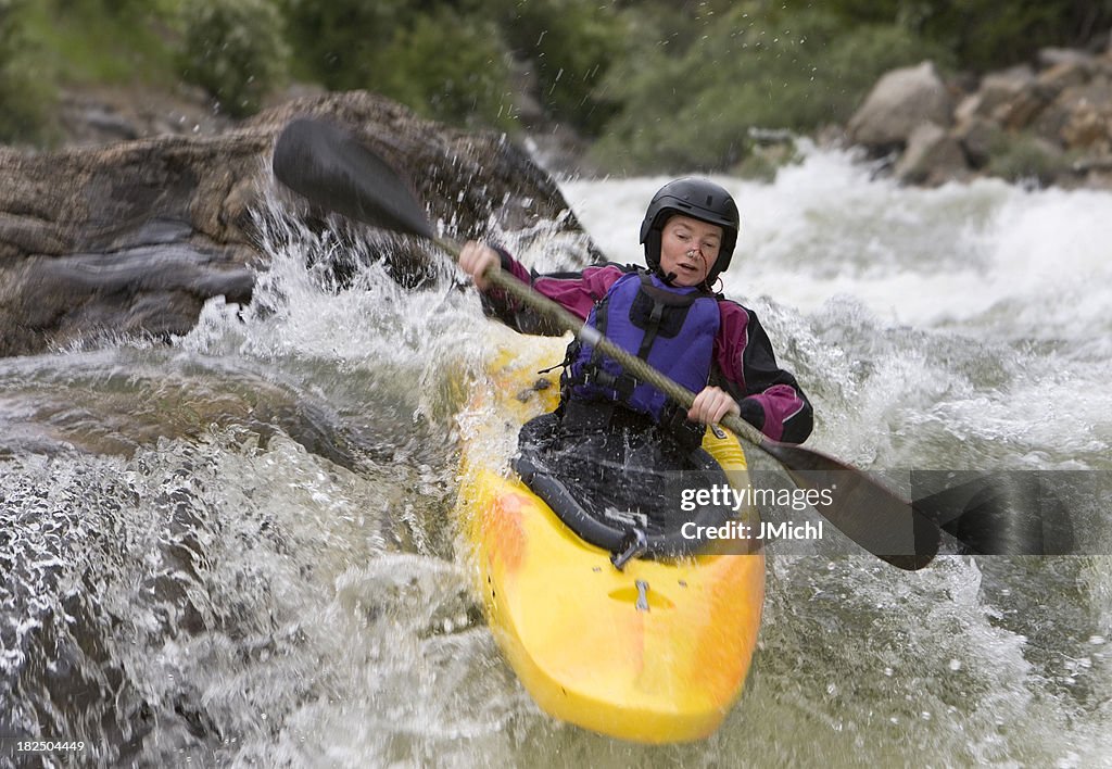 Woman White Water Kayaking